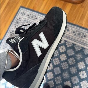 New Balance Men's Black and White Sneakers